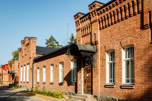 istock Beautiful vintage red brick building at sunny day 1287572777
