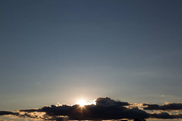 istock Beautiful textured sky with clouds at sunset 1287573822