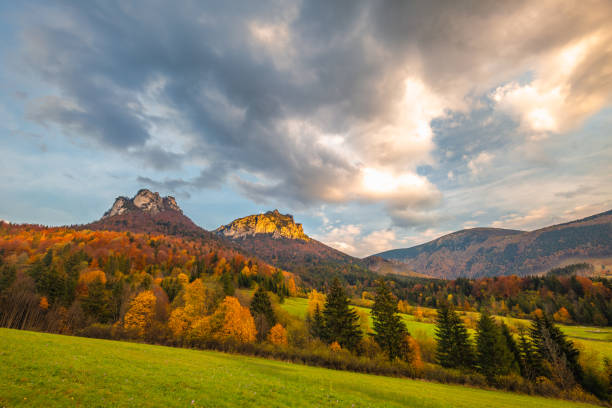 istock Autumn rural landscape with mountains peaks on background. 1287574802
