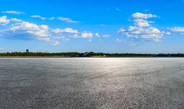 istock Empty road and green forest with mountain landscape in Beijing. 1287577533