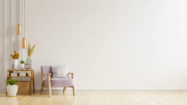 istock The interior has a armchair on empty white wall background. 1287577565