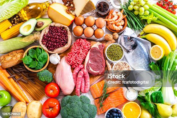 Food Backgrounds Table Filled With Large Variety Of Food Shot From Above Stock Photo - Download Image Now