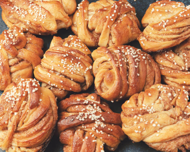 Traditional Swedish cinnamon buns. Very popular snack throughout Scandinavia. Top view stock photo