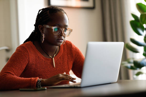 istock Young woman working from home 1287581006