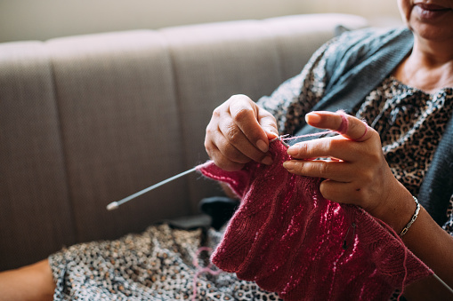 Senior women knitting