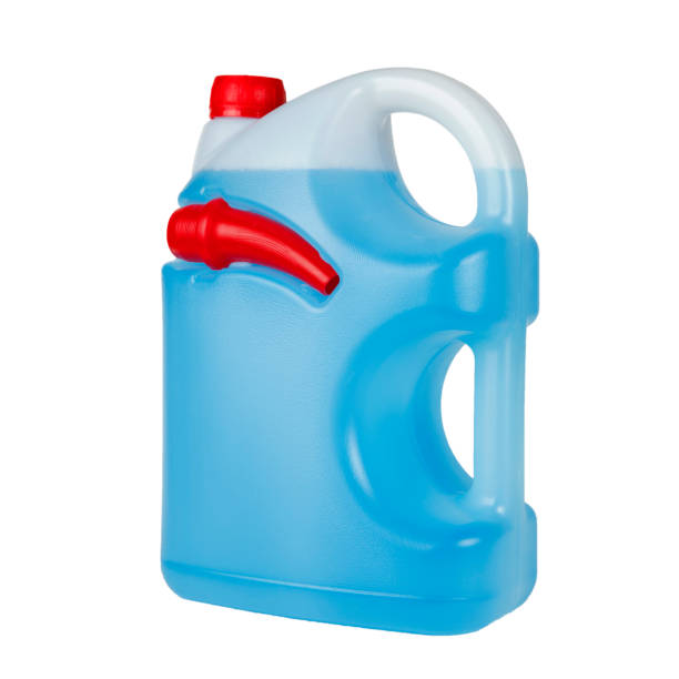 istock Blue windshield washer fluid in canister isolated on white background. Antifreeze for car screen wash 1287585936