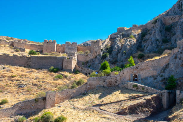 istock Greece, Acrocorinth, Upper Corinth, the acropolis of ancient Corinth, is a monolithic rock overseeing the ancient city of Corinth 1287587109