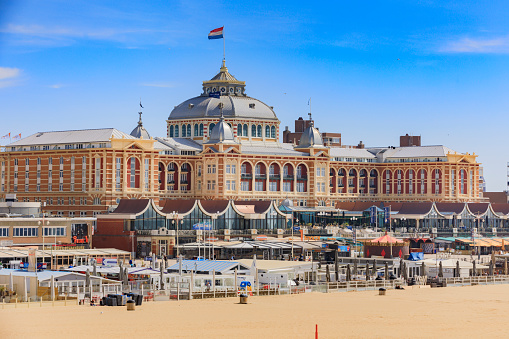 The Hague, Netherlands - May 18, 20209: the boulevard of Scheveningen seaside resort, with its characteristic Kurhaus Hotel in the foreground