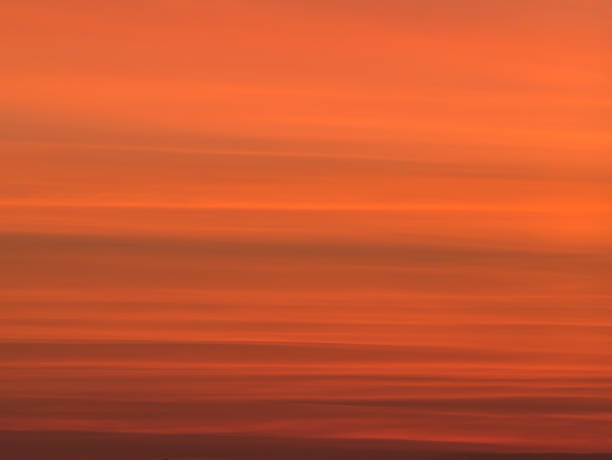 istock Long exposure picture with the orange sky at sunset. 1287591096