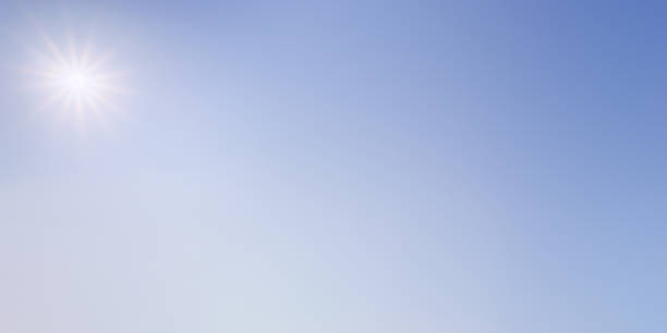 istock background of clear blue sky with sun 1287591100