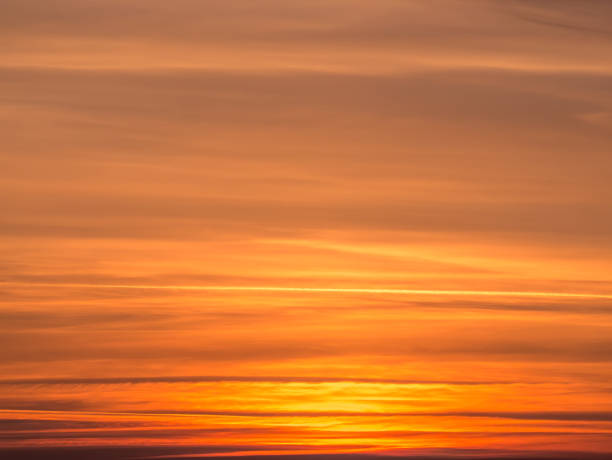 istock Long exposure picture with the orange sky at sunset. 1287591115