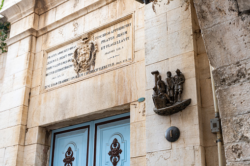 Jerusalem, Israel, November 14, 2020 : The first station of the Cross Procession on the wall in Lions Gate Street near the Lions Gate in the old city of Jerusalem, in Israel