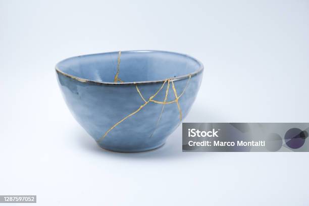 Kintsugi Blue Bowl Repaired With Gold Stock Photo - Download Image Now - Kintsugi, Bowl, Ceramics