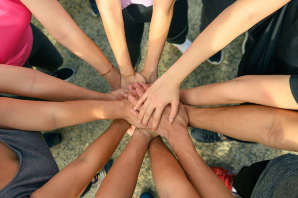 istock Asian joggers cheering at finishing line 1287603480