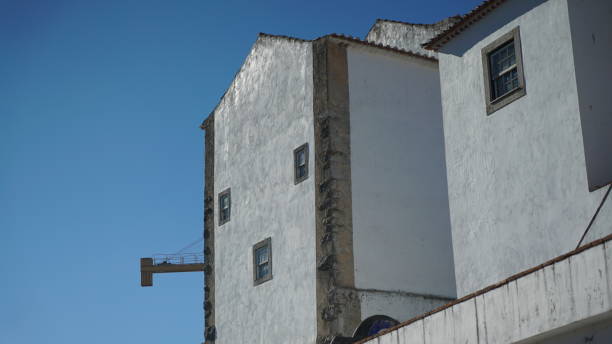 istock obidos streets window village streets 1287605579
