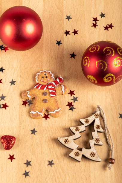 istock Christmas Decorations with Gingerbread man and christmas baubles background 1287608835