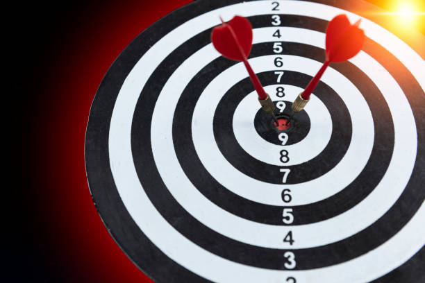 istock Darts hit target. It's like a successful business. 1287609158