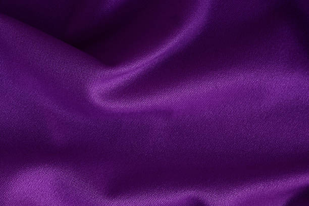 istock Purple fabric cloth texture for background and design art work, beautiful crumpled pattern of silk or linen. 1287609192