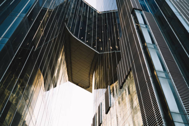istock Low angle of modern glass building facade 1287610889