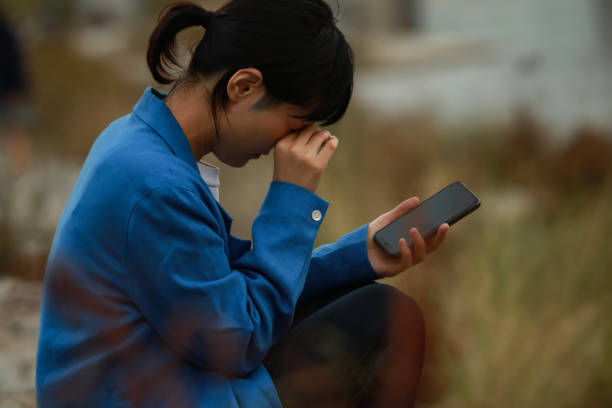 istock A woman crying with her smartphone in her hand 1287611109
