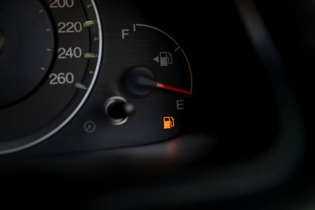 istock Empty fuel warning light in car dashboard. Fuel pump icon. gasoline gauge dash board in car with digital warning sign of run out of fuel turn on. Low level of fuel show on speedometer dashboard. 1287612251