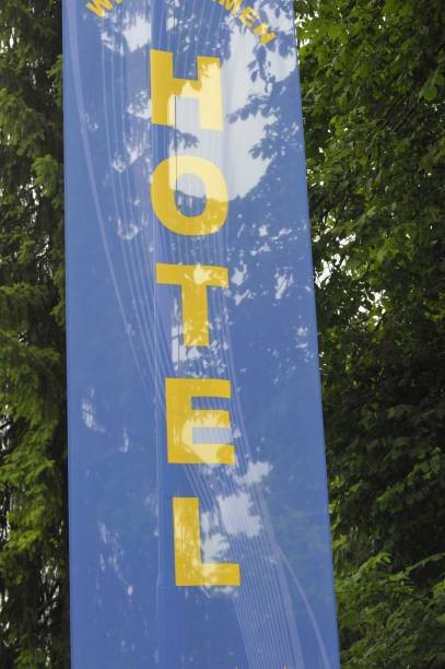 istock blue Hotel banner with yellow font 1287612354