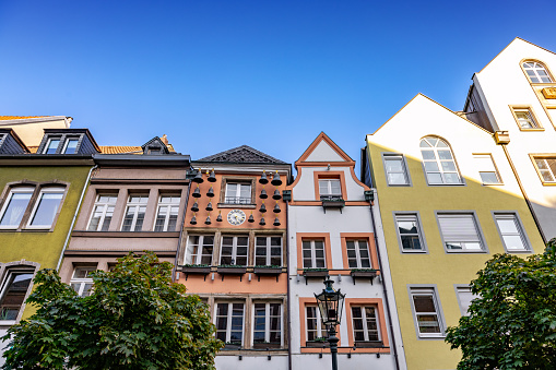 low angle view on multicolored historic town houses in Düsseldorf city street