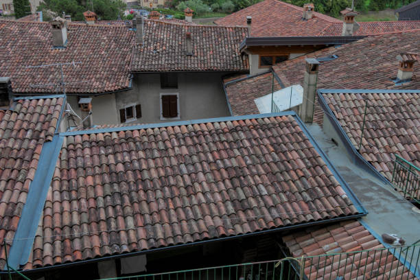 istock View of brick tiled roofs in a small town 1287614095