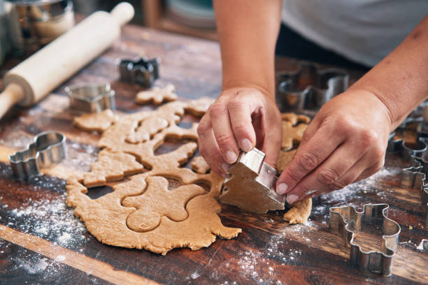 istock Preparing Gingerbread Cookies in Domestic Kitchen 1287615241