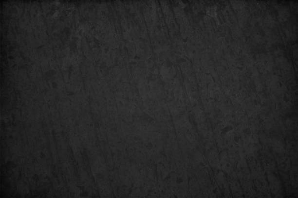 ilustrações, clipart, desenhos animados e ícones de fundo vetor de preto texturizado de cor preta se assemelhando a uma rocha de ardósia ou quadro-negro - backgrounds black black background gradient