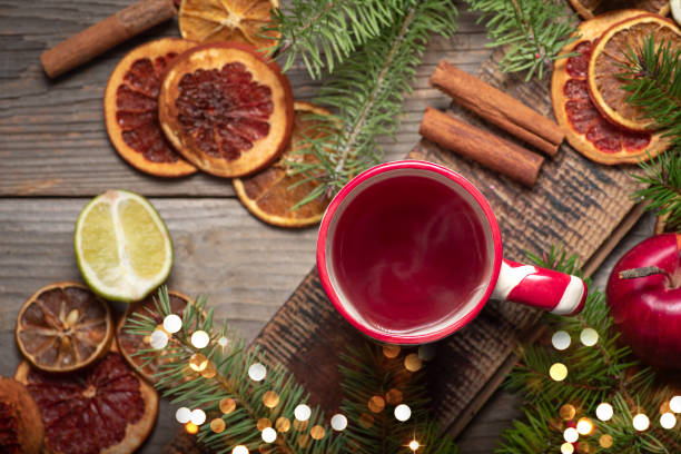 Winter warm cup of tea with dried fruit and cinnamon