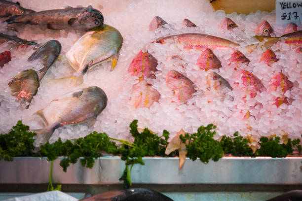 istock Fresh fish displayed on ice at a fishmonger in Walthamstow market, London 1287617762