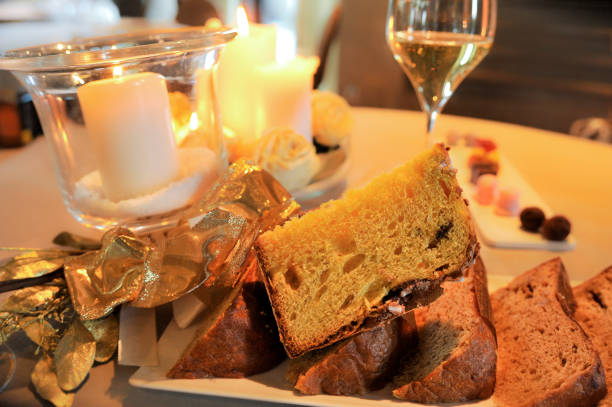istock Slices of panettone on Christmas table decorated 1287621394