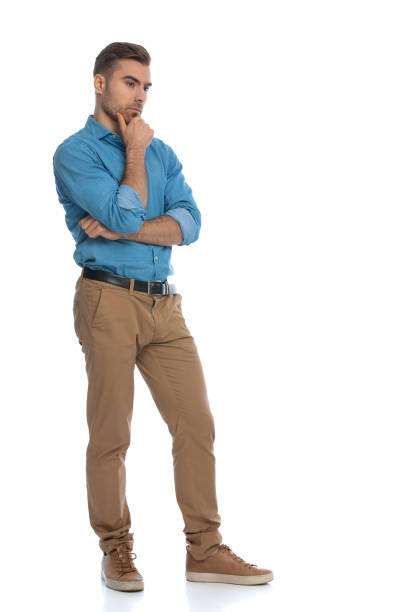 istock casual handsome man looking away and dreaming about something 1287622586