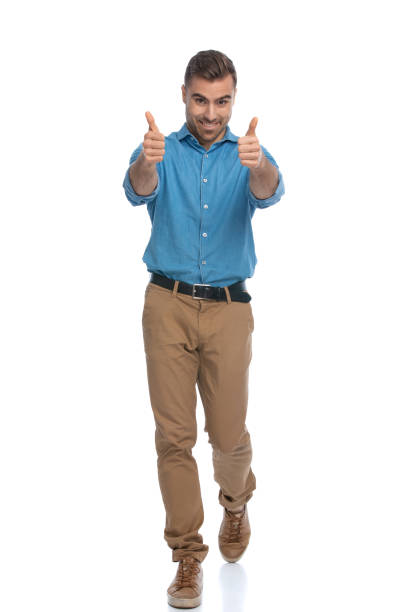 istock young casual guy walking towards the camera 1287622626