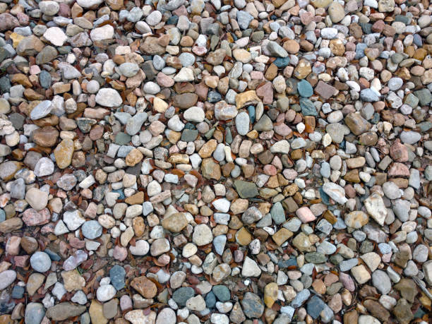 istock colorful beach pebbles stone rocks path overhead view with deep shadows and bright details as backdrop background for website architecture presentation scenery 1287622847