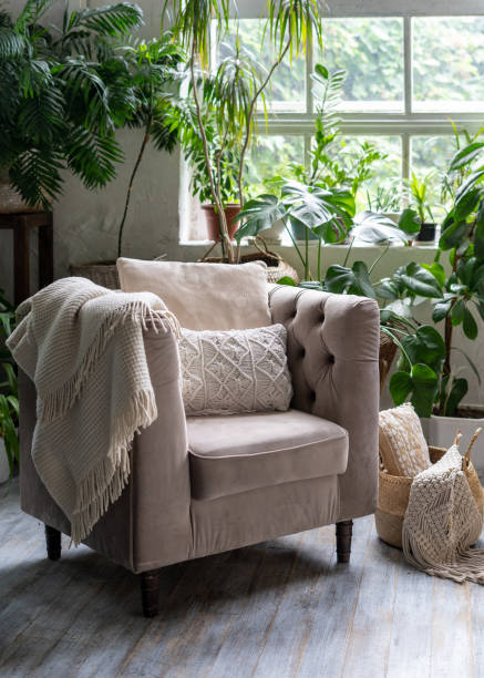 istock Comfortable armchair with cushion in living room 1287623526