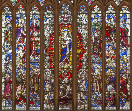 London - The main stained glass in sanctuary of church Immaculate Conception, Farm Street with the Madonna and patriarchs and kings of Israel (1912).
