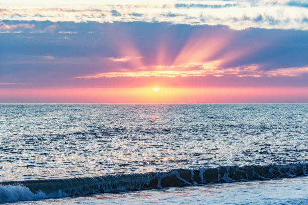 istock Sunset sky over the calm surface of the sea. 1287624940