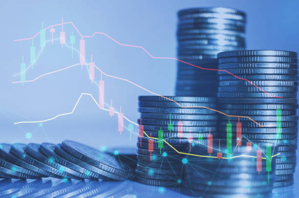 istock double exposure of city with row of coin stack with growth stock chart and graph progress report for business investment finance banking and money saving concept. 1287625670
