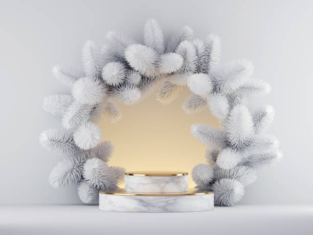 istock 3d render, Christmas white background with marble podium and round frozen spruce wreath illuminated with warm light. Commercial seasonal showcase mockup with blank space for product presentation. 1287626491