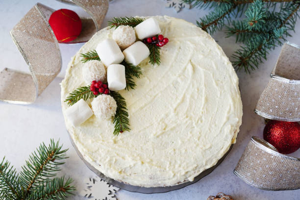istock christmas cake with decor and fir branches on gray table 1287634805