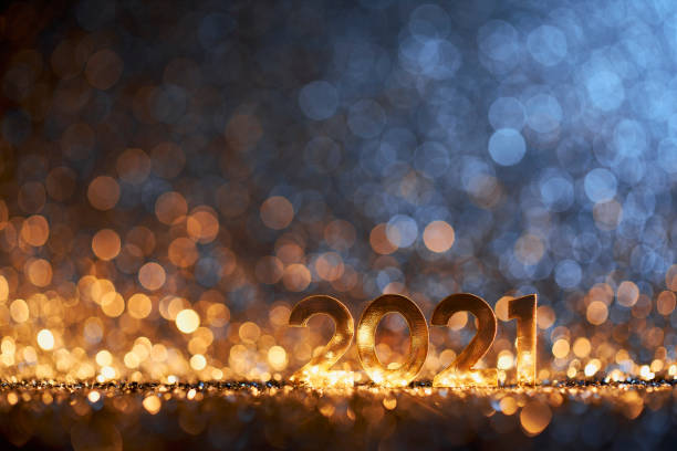 istock Happy New Year 2021 - Christmas Gold Blue Glitter 1287635580
