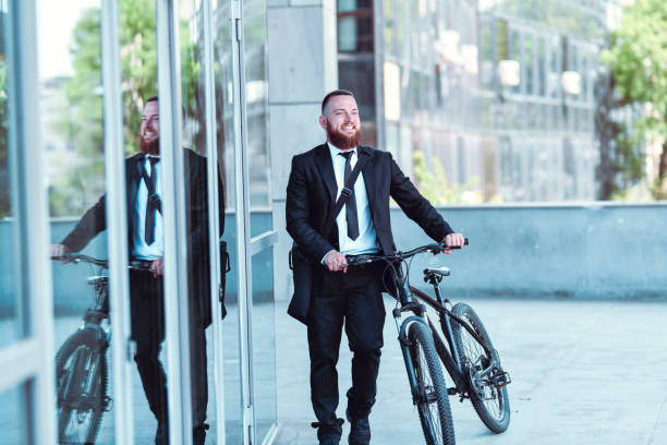 Male Accountant Arriving To Work With Bicycle