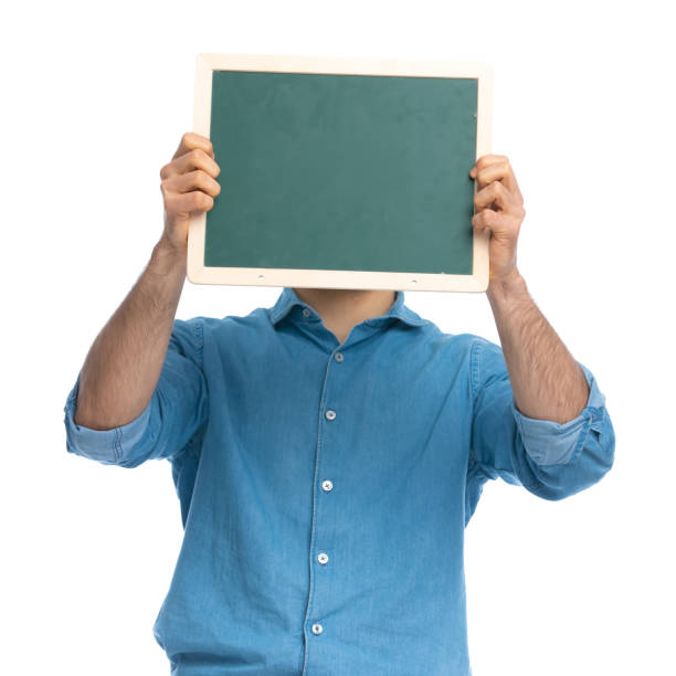 istock casual guy hiding his face from the camera 1287640154