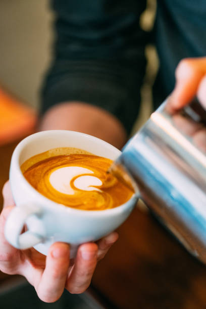 istock Barista is Making Coffee Latte 1287643022