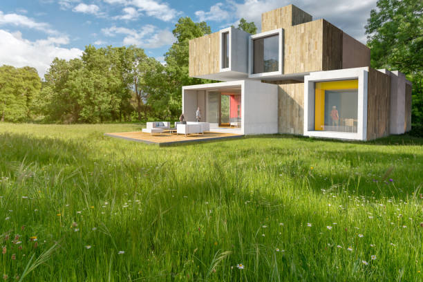 istock Modern cubic house in a meadow 1287645641