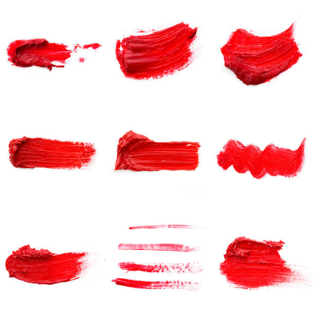 istock Red colored brush stroke paiting over isolated background, canvas watercolor texture, red lipstick smudge 1287647112