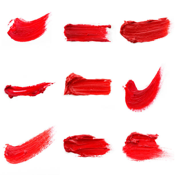 istock Red colored brush stroke paiting over isolated background, canvas watercolor texture, red lipstick smudge 1287647121