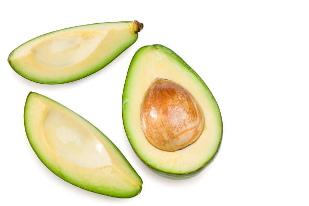 istock fresh avocado with slices isolated on white background. top view. clipping path 1287647707